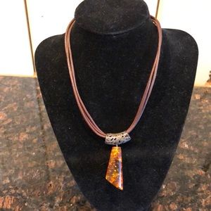 Brown necklace with orange pendant
